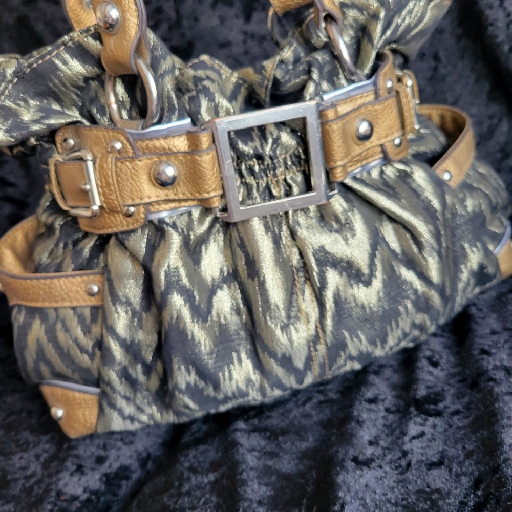 Wilson Leather metallic black leather bag.